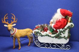 A WOODEN CHRISTMAS SLEIGH AND RUDOLPH