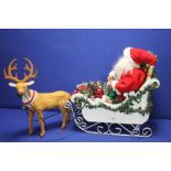 A WOODEN CHRISTMAS SLEIGH AND RUDOLPH