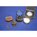 A VINTAGE POCKET COMPASS TOGETHER WITH A WHITE METAL CHAIN POCKET WATCH ETC