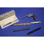 AN UNUSUAL COMBINATION, INKWELL/PEN/PENCIL SET IN THE FORM OF A PISTOL, TWO QUILL KNIFE LETTER
