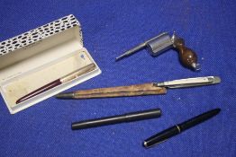 AN UNUSUAL COMBINATION, INKWELL/PEN/PENCIL SET IN THE FORM OF A PISTOL, TWO QUILL KNIFE LETTER