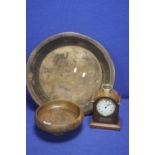 A LARGE ANTIQUE WOODEN BOWL TOGETHER WITH A SMALLER WOODEN BOWL AND A CLOCK