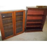 A SOLID GLAZED BOOKCASE AND A BOOK SHELF