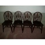 FOUR MODERN WHEEL BACK DINING CHAIRS