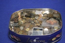 A TIN OF BRITISH AND WORLD COINS