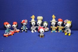 A COLLECTION OF SNOOPY PLASTIC FIGURES