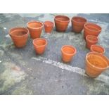 A SELECTION OF 11 TERRACOTTA PLANT POTS