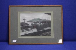 A GUY WORSDELL SIGNED GOUACHE AND PASTEL OF SKIPTON STATION, 58 X 42 CM