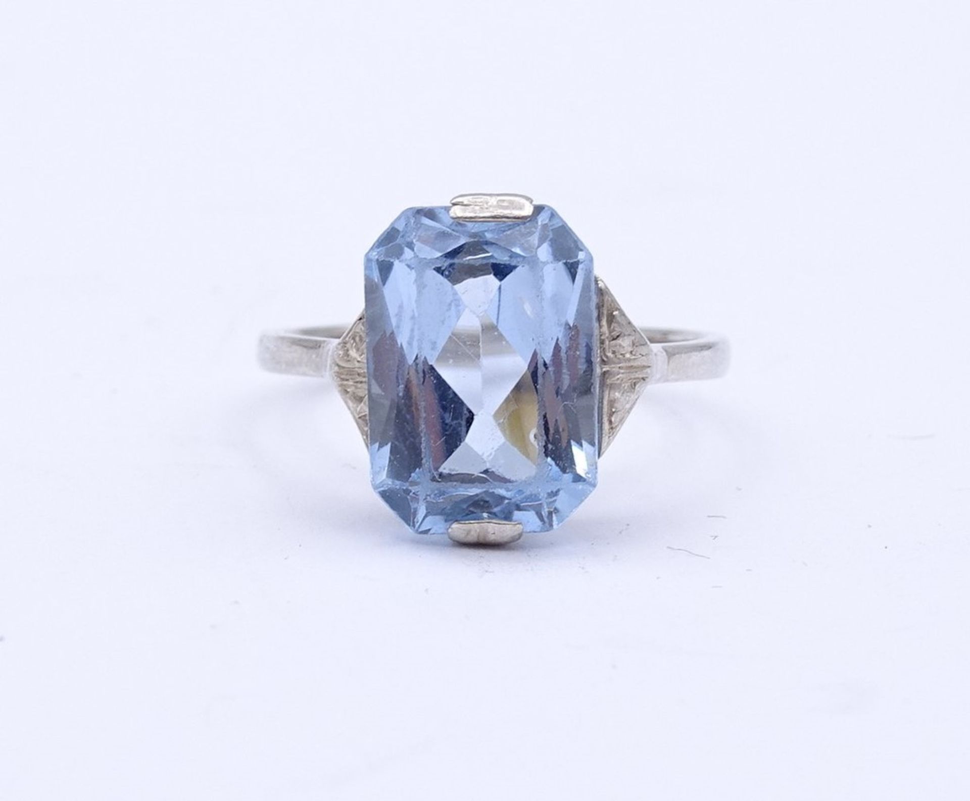 Silber Ring mit einen hellblauen facc. Edelstein, Silber 0.835, RG 57, 3,5g.