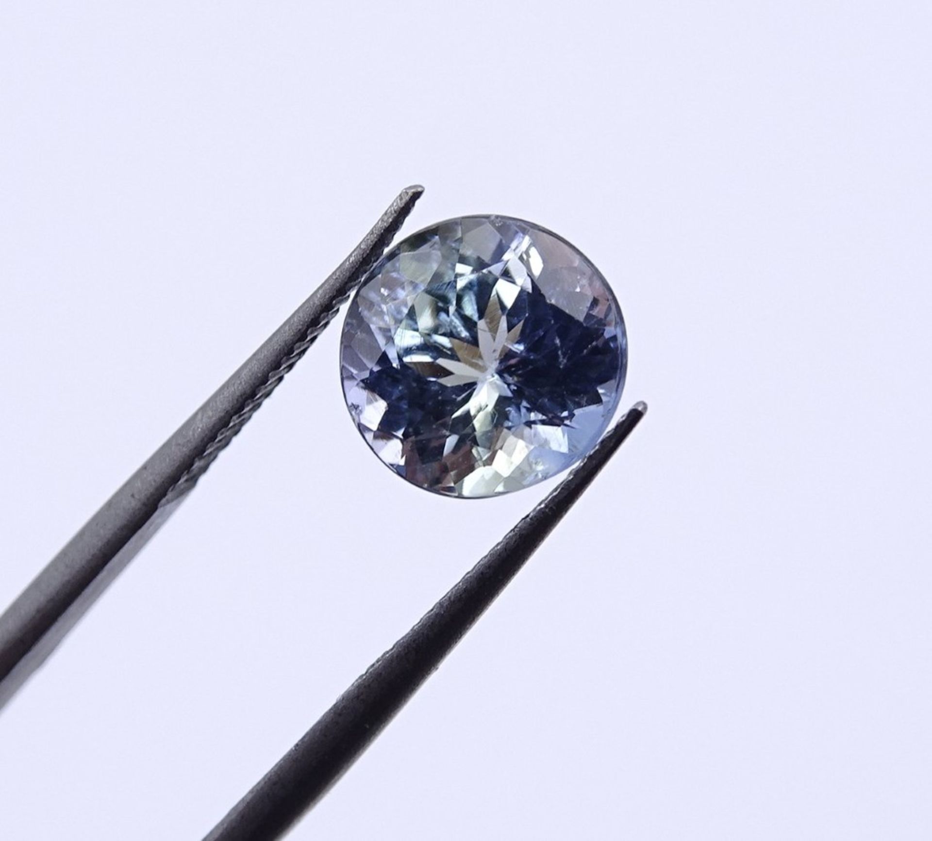 Rund facc. Tansanit 1,43ct.,  D.7,0mm, H- 4,4mm - Bild 4 aus 5