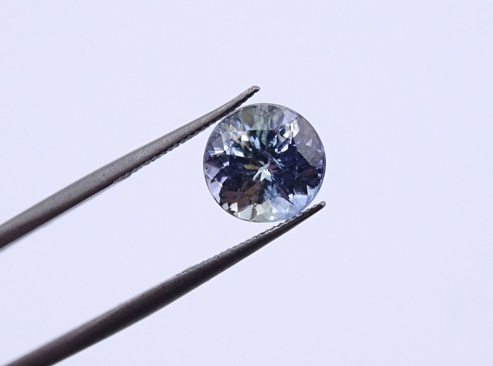 Rund facc. Tansanit 1,43ct.,  D.7,0mm, H- 4,4mm