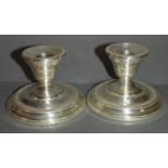 Paar Kerzenhalter, Silber-925-, gefüllt, H-7 cm, D-9,8 cm, kl. Dellen etc.