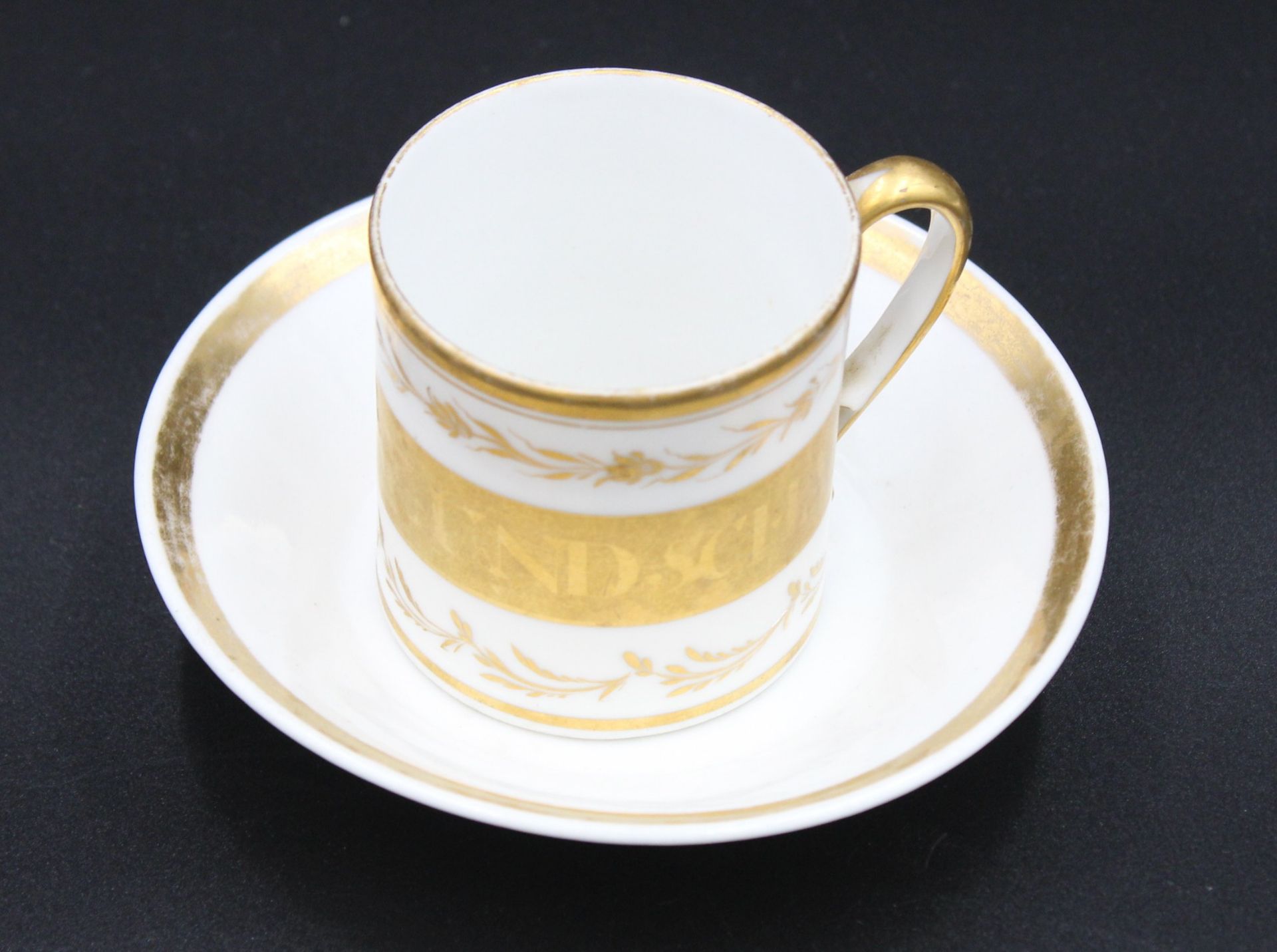 Tasse m. ,U.T., 19. Jhd., , beschriftet "Wahre Freundschaft", berieben, Tasse H-6,2cm.