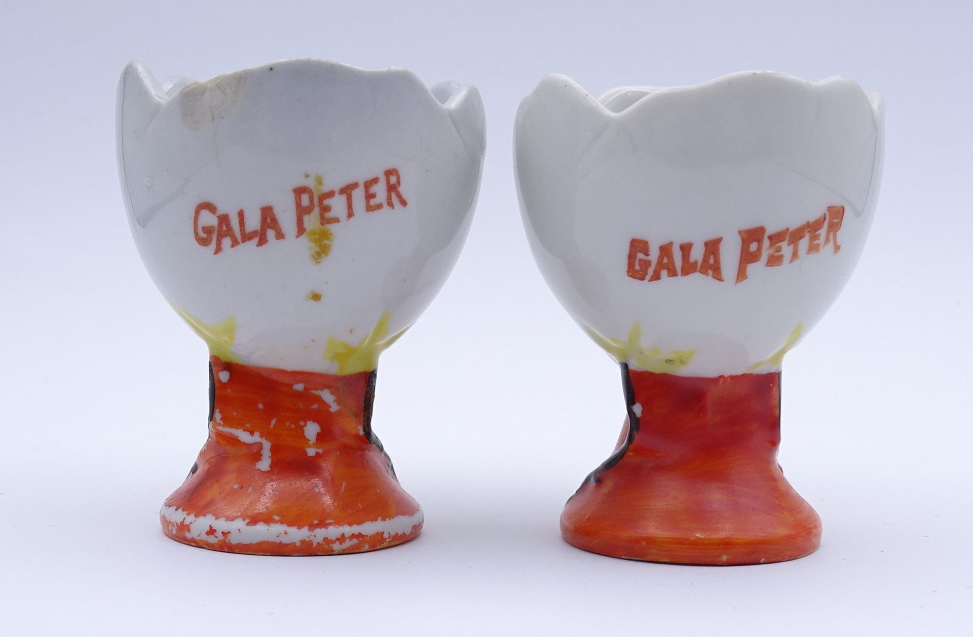 2 figürliche Eierbecher D.R.G.M. "Gala Peter", einige Abplatzer vorhanden, H. 6,0cm - Image 3 of 4