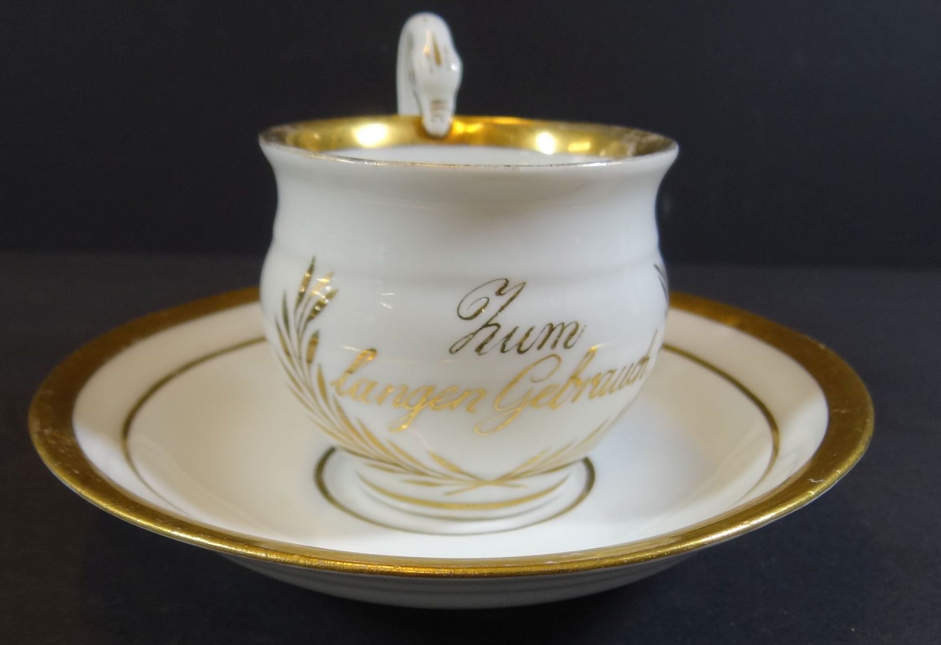 Kaffeetasse mit U.T. "Meissen" um 1860, beschriftet "Zum langen Gebrauch, Golddekor etwas berieben,