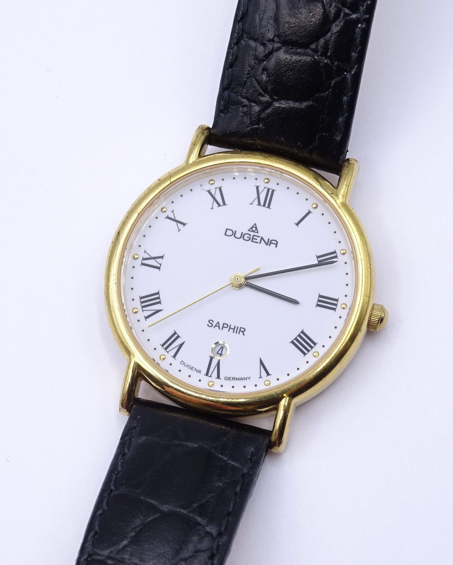 Herren Armbanduhr DUGENA SAPHIR, Quartzwerk, D. 35mm, goldfarbenes Gehäuse, ungetragen, steht - Bild 4 aus 7