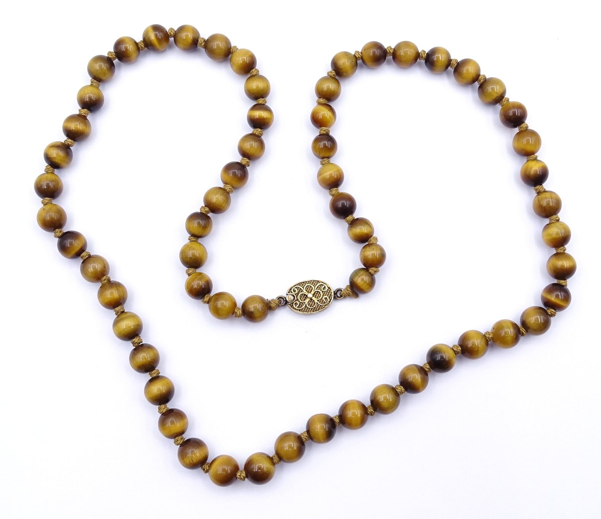 Kugelförmige Tigeraugen Halskette mit Silber Verschluss, L. 64cm, 53g.,