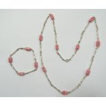 Kette und Armband, 835/000, Zwischenelemente aus Rhodochrosit, L. 72 und 21 cm, zus. 56 gr.