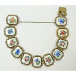 925er-Silberarmband, emailliert mit Blütendekor, L. ca. 21 cm, B. 2,2 cm, 38 gr.