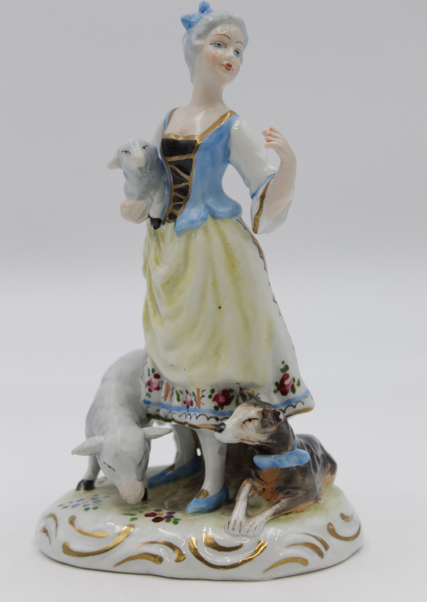 Figur, gemarkt, Dame mit Lamm, Schaf und Hund, polychrome Bemalung, Hand und Hundeohr bestossen, H-