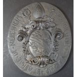 ovale Eisenplatte mit Wappen des Benediktinerklosters Neresheim, 16x14 cm