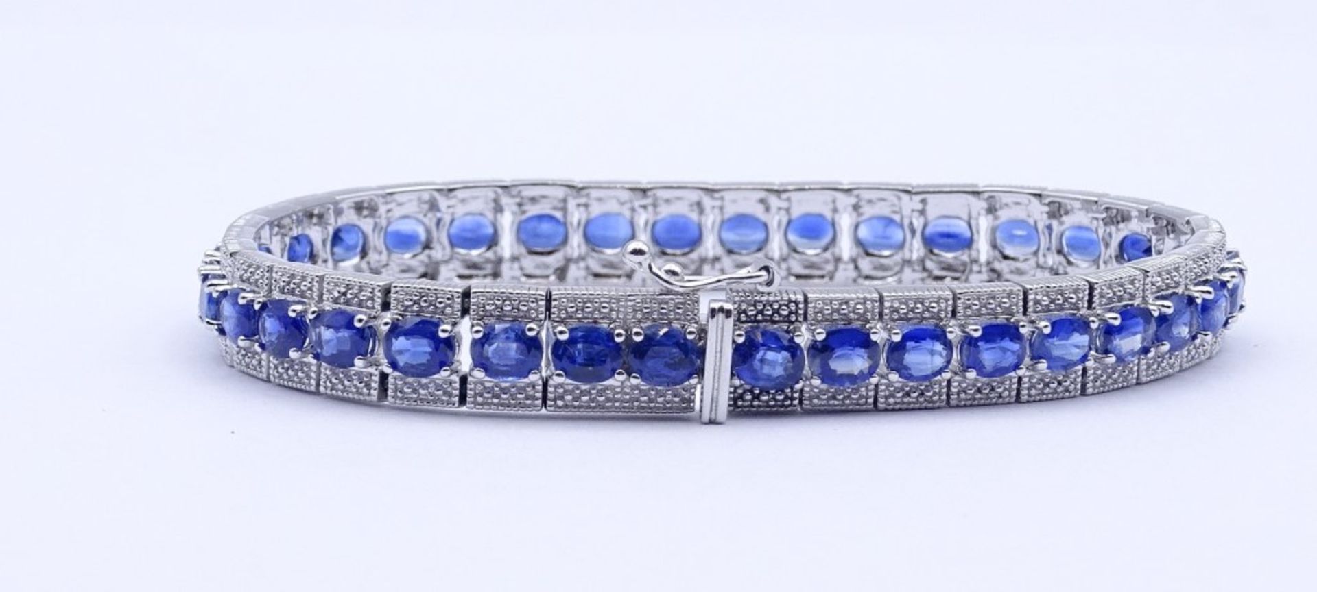 Harry Ivens Armband mit 36 oval facc. Saphiren, Sterling Silber 0.925, L. 19,5cm, B. 8,7mm, 22,2g., - Bild 6 aus 6