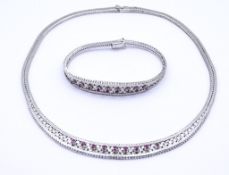 Schmuckset mit Rubinen, Silber 0.925, Halskette und Armband, zus.53,5g.