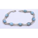 925er Silber Armband mit 8 Larimar Cabochons, L. 22,5cm, 14,1g.