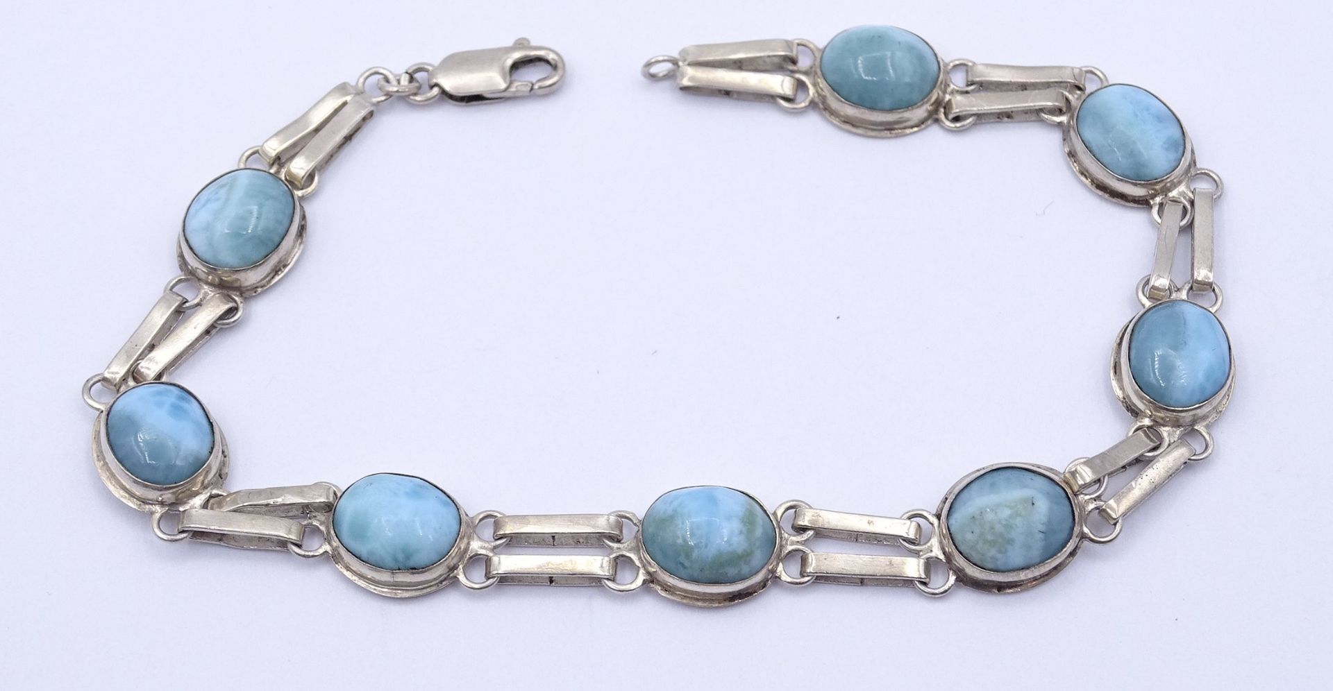 925er Silber Armband mit 8 Larimar Cabochons, L. 22,5cm, 14,1g.