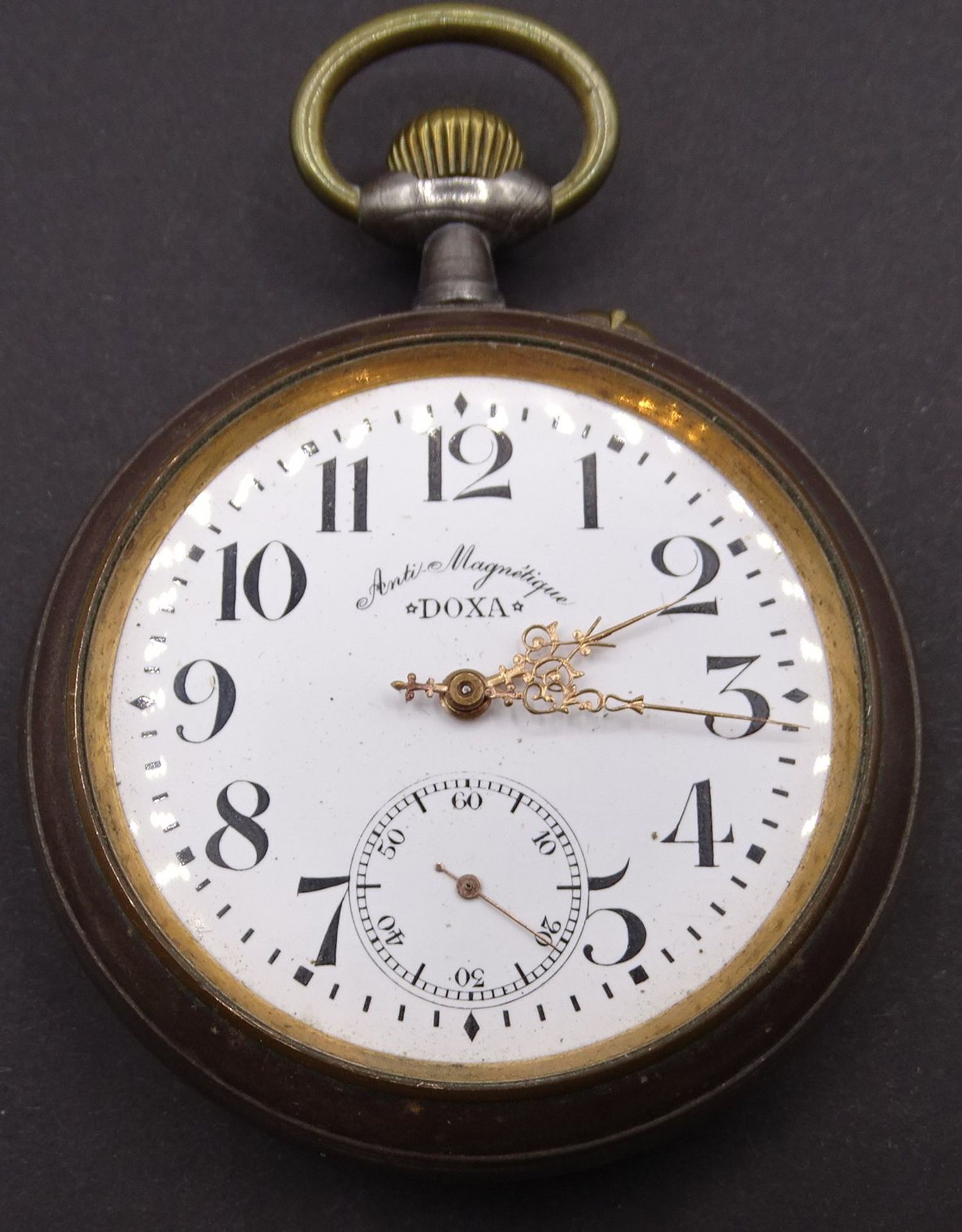 grosse Taschenuhr "Doxa" Metallgehäuse. Werk mit Glas-Staubdeckel, Uhrenglas fehlt, Werk läuft, D-7