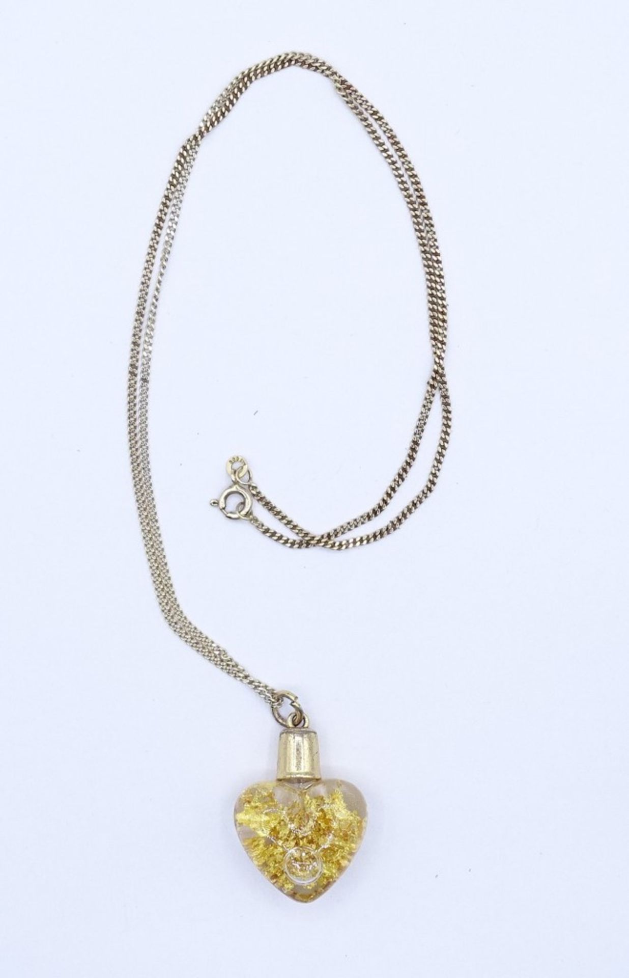 333er-Gelbgoldkette mit Herzanhänger, gefüllt mit Blattgold, L. Kette: 53 cm, 4,12 gr., L. Anhänger