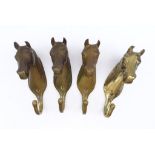 4 Wandhaken in Form von Pferdeköpfen, Messing, L. ca. 15 cm, B. ca. 8 cm
