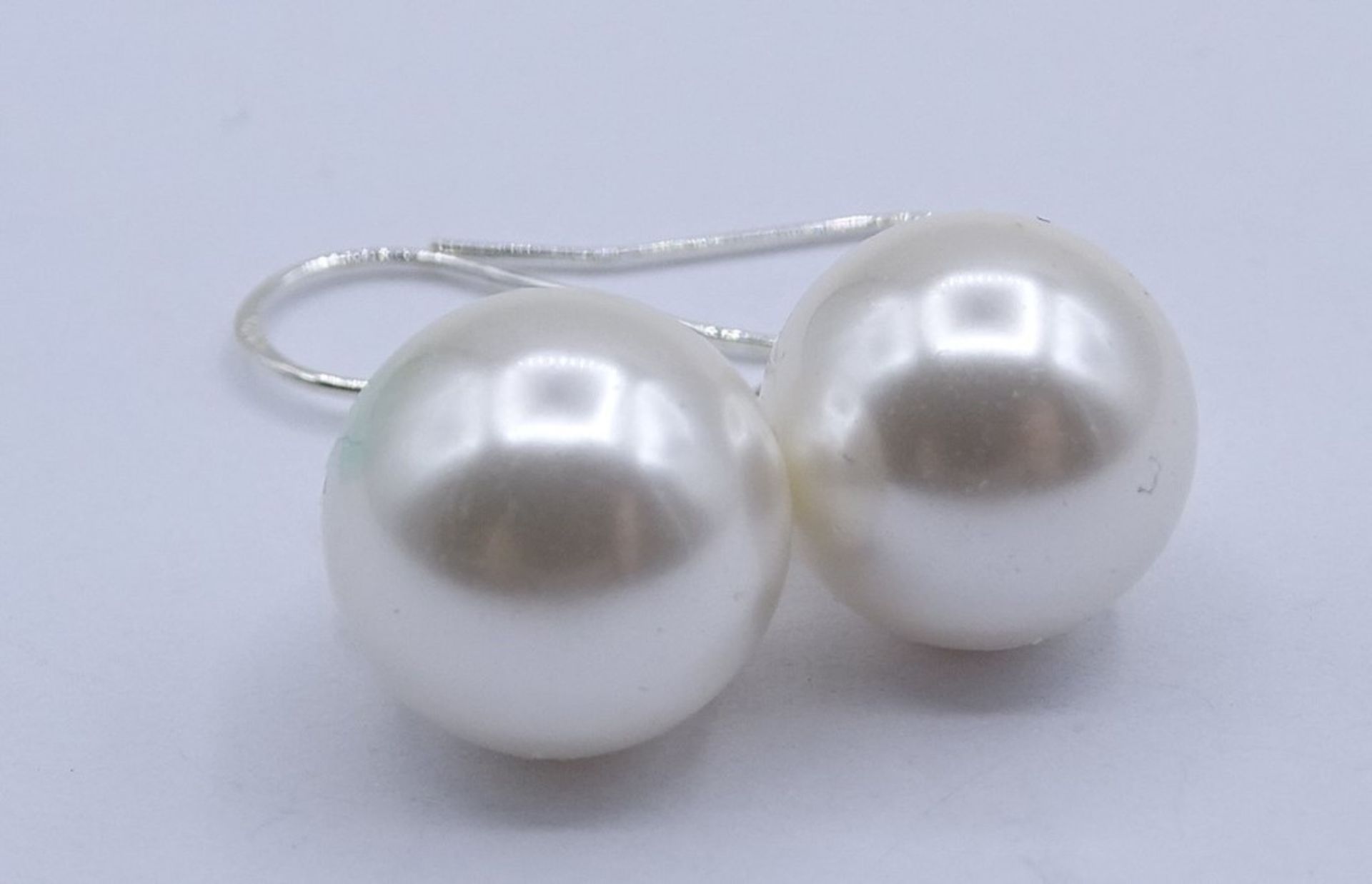 Perlenohrhänger, 925er-Silbermontur, Ø Perlen: 1,1 cm, L. 3,5 cm, 5 gr., eine Perle mit Kratzer - Bild 3 aus 4