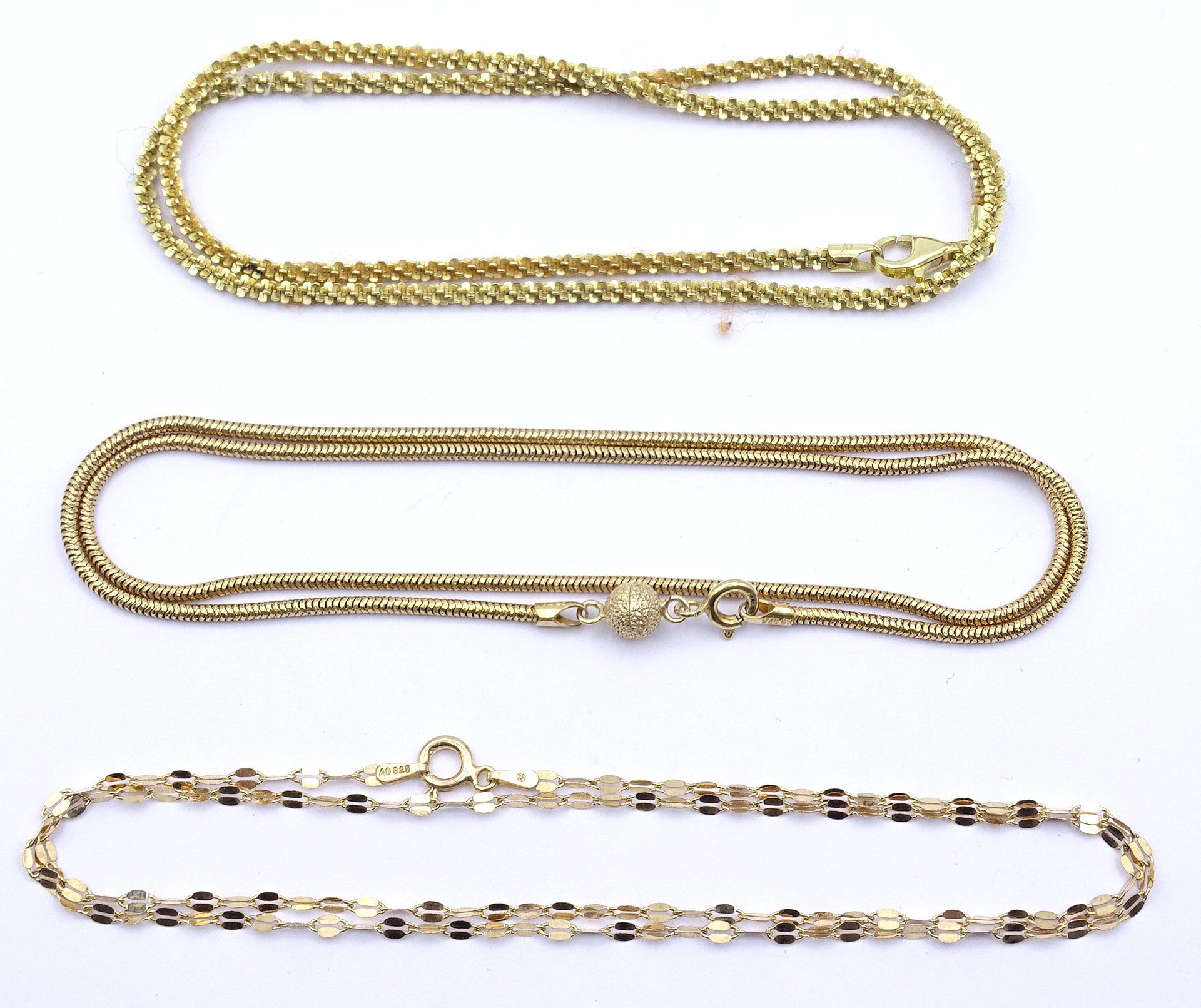 Drei Silberketten 0.925 - vergoldet, L. 45cm, 50, 49,5cm, zus. 17,5g.