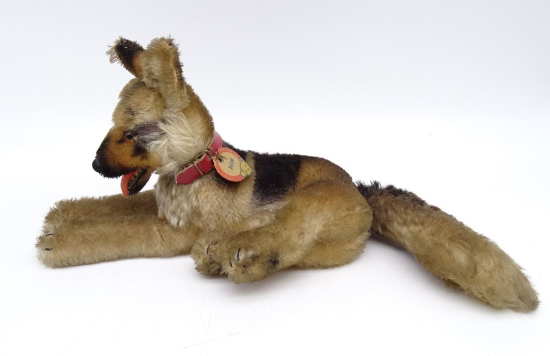 Schäferhund "Arco" von Steiff mit Halsband und Etikett, mit Altersspuren, reinigungsbedürftig