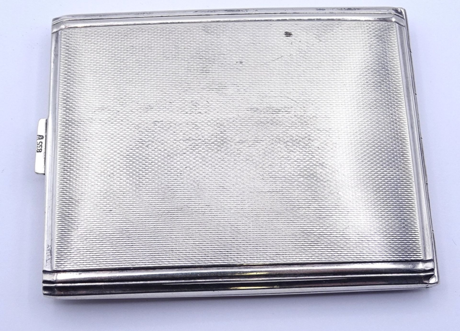 Zigaretten Etui, Silber 0.835, Initialen M.L. 7,4x9,2cm, 86g. - Image 2 of 4