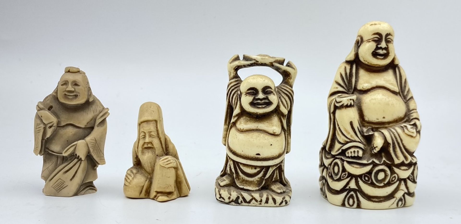 4 div. Buddha Figuren, Kunstmasse, größte H- 7,0cm