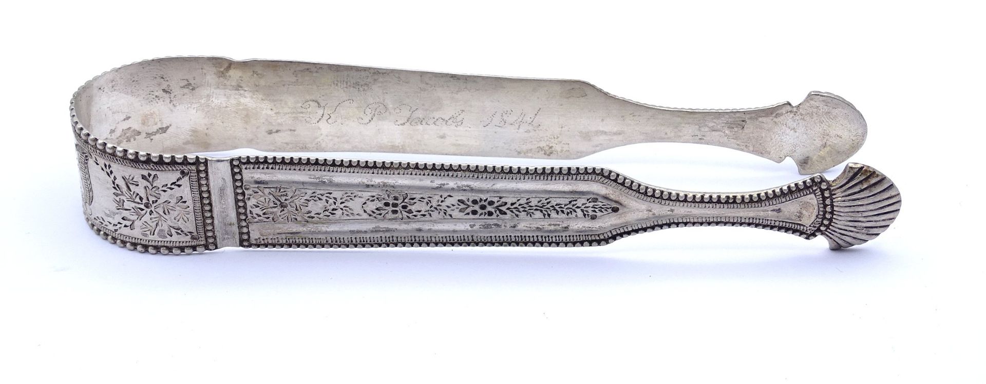 Alter Zuckerzange, Silber (gepr.) Punktgravur und Datierung 1841, L. 15cm, 65g.