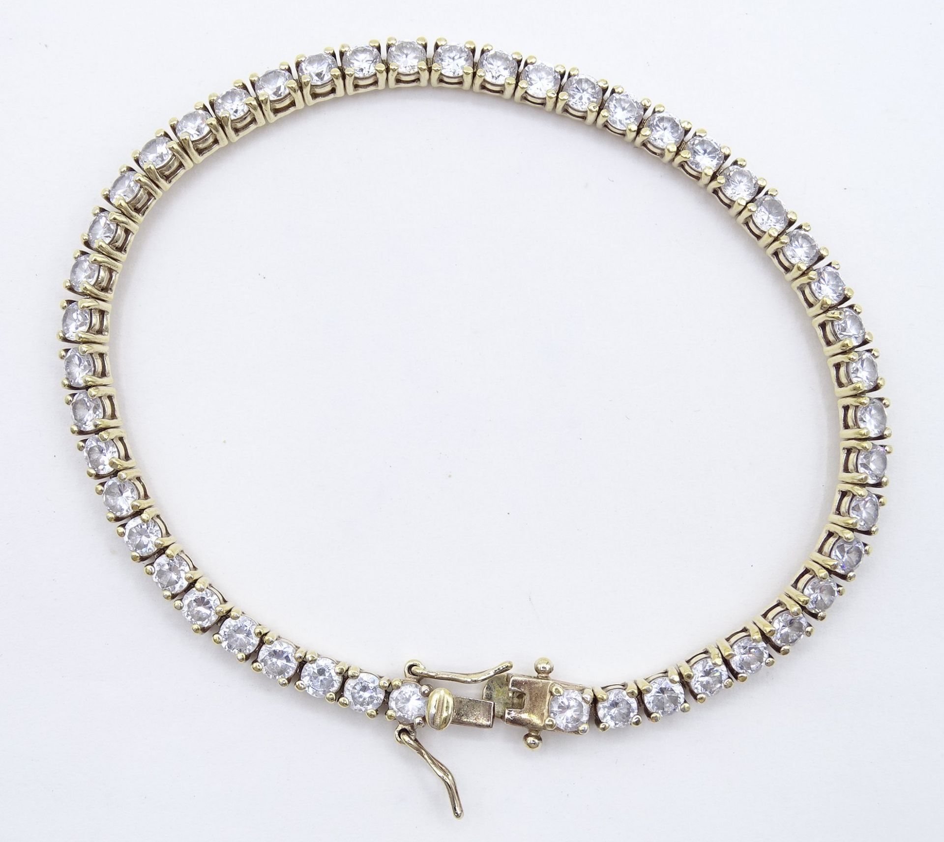 Tennisarmband, 925er-Silber vergoldet, L. 20 cm, 14 gr.