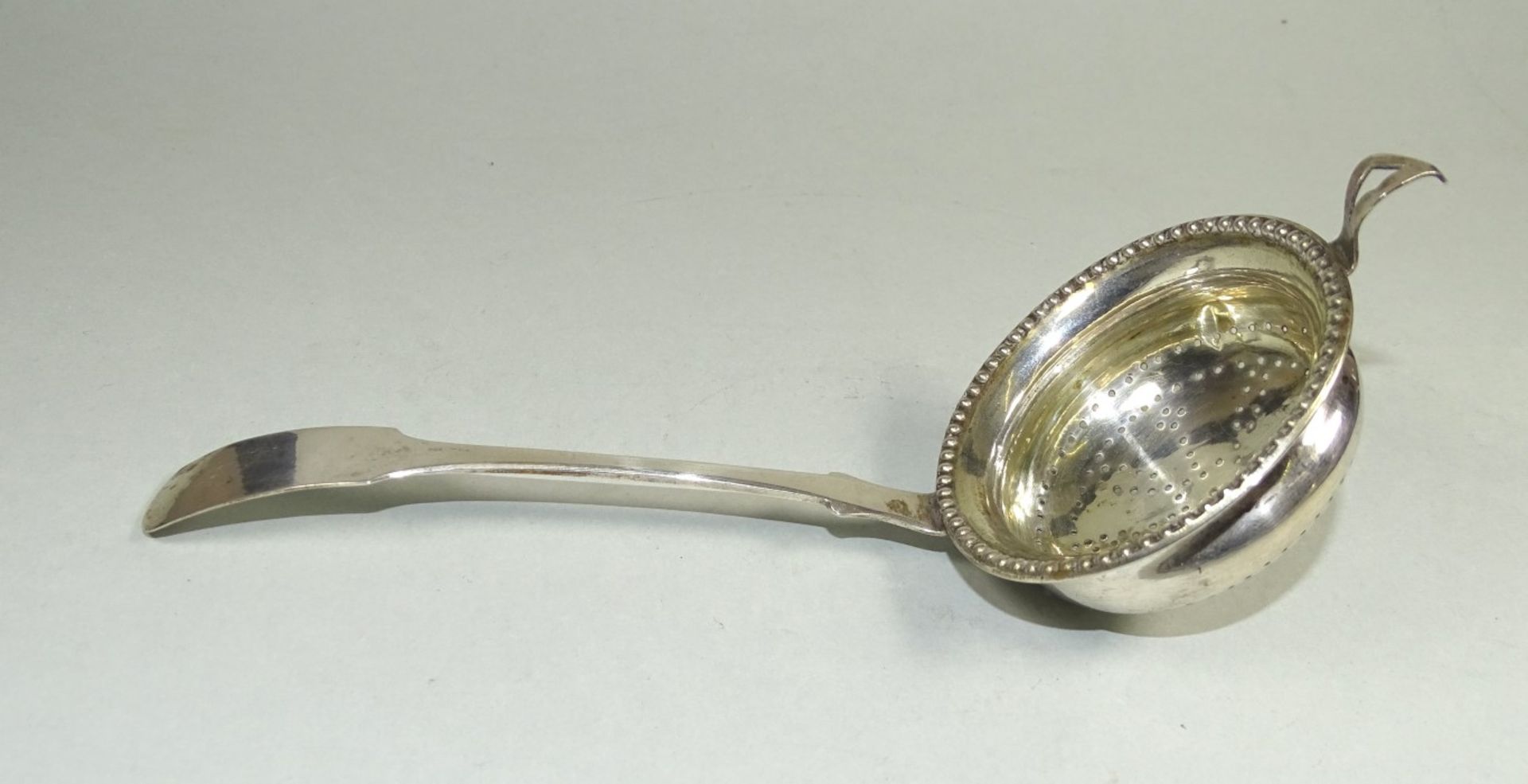 1 Biedermeier Teesieb, um 1850, -750- Silber, 33,36 gr., L- 18 cm, Alters-u. Gebrauchsspuren