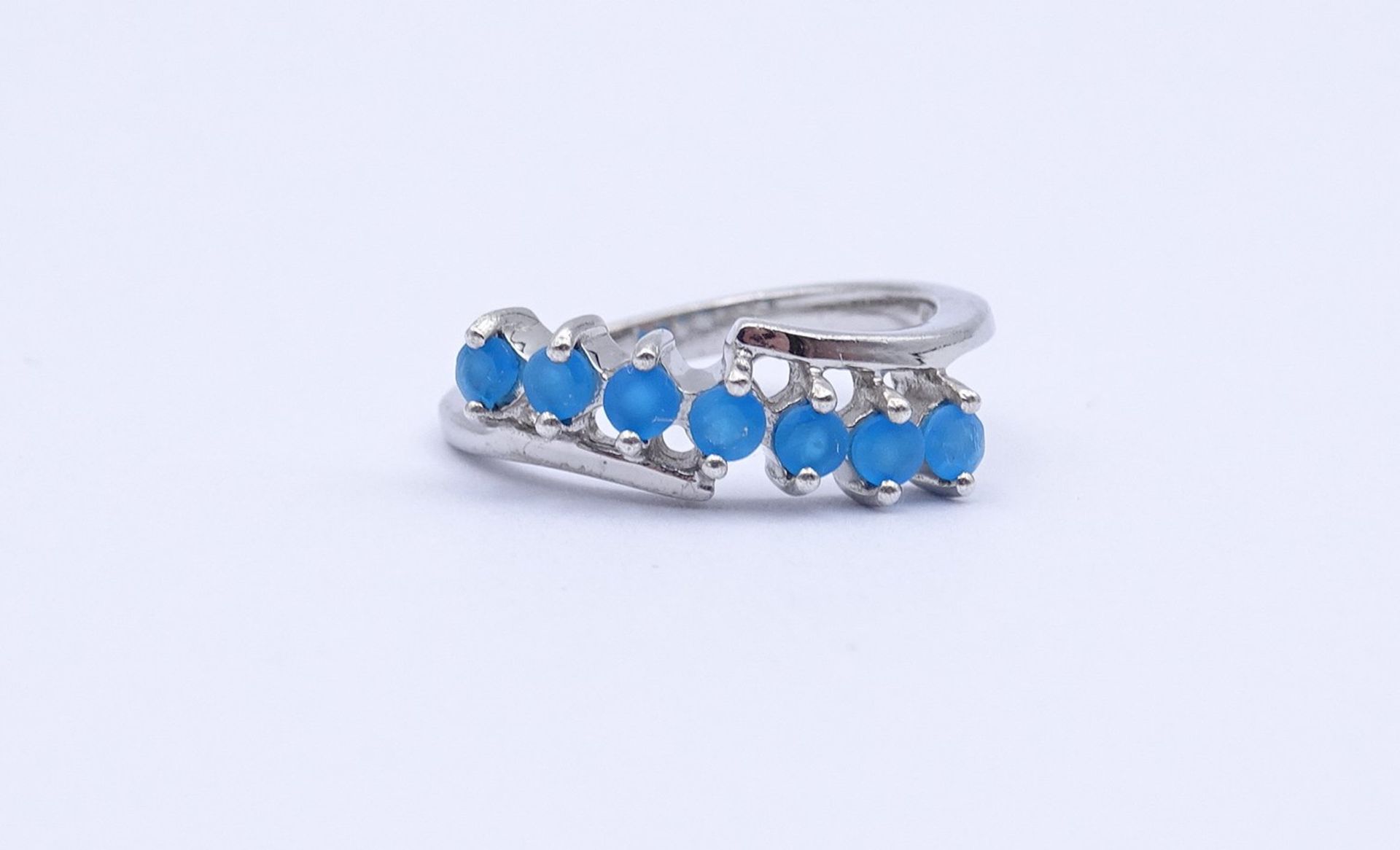 Silber Ring mit rund facc. blauen Steinen, 0.925, 2,5g., RG 50