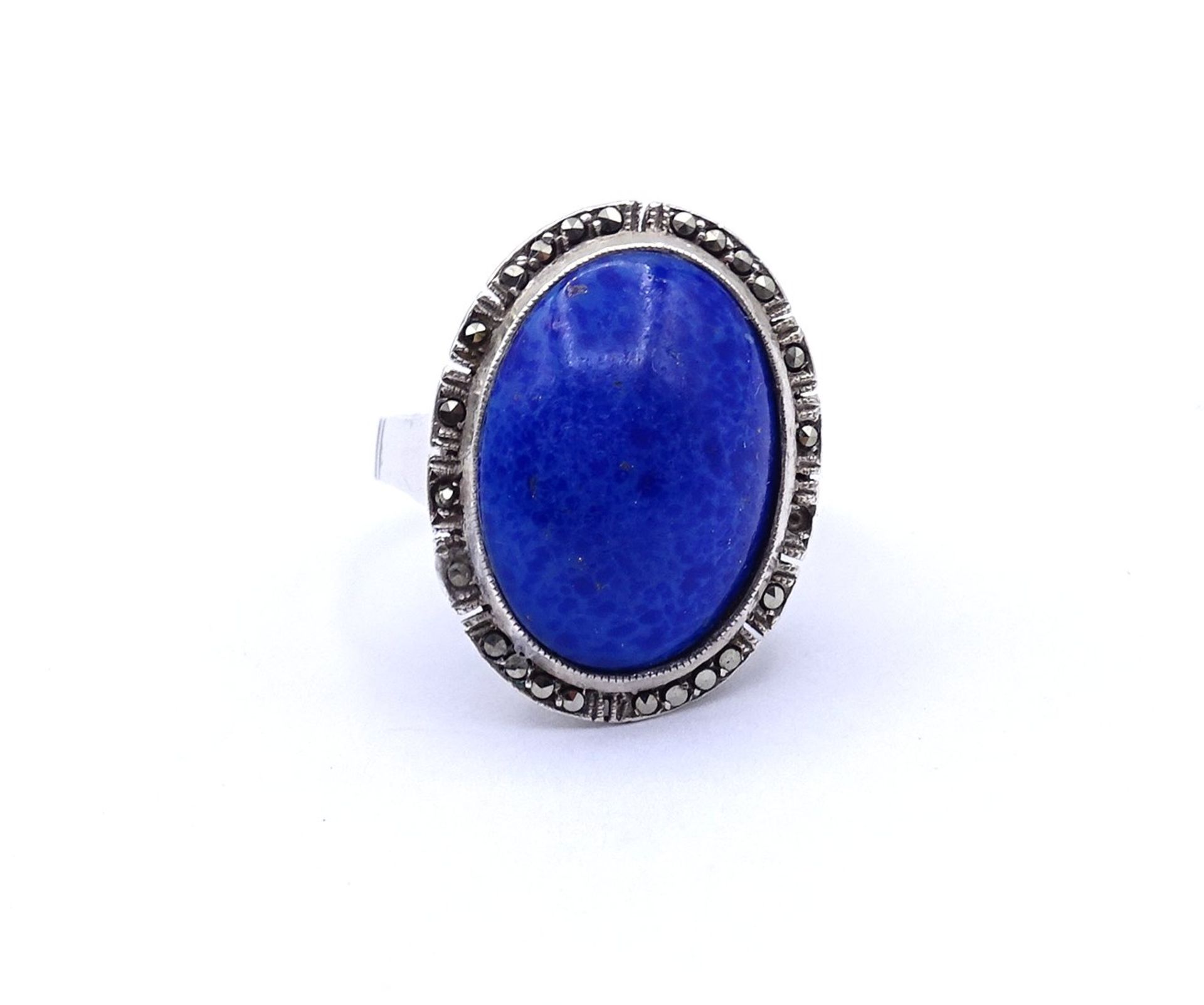 800er Silber Ring mit einem blauen Cabochon und Markasiten, 1x Markasit fehlt, 7,4g., RG 54