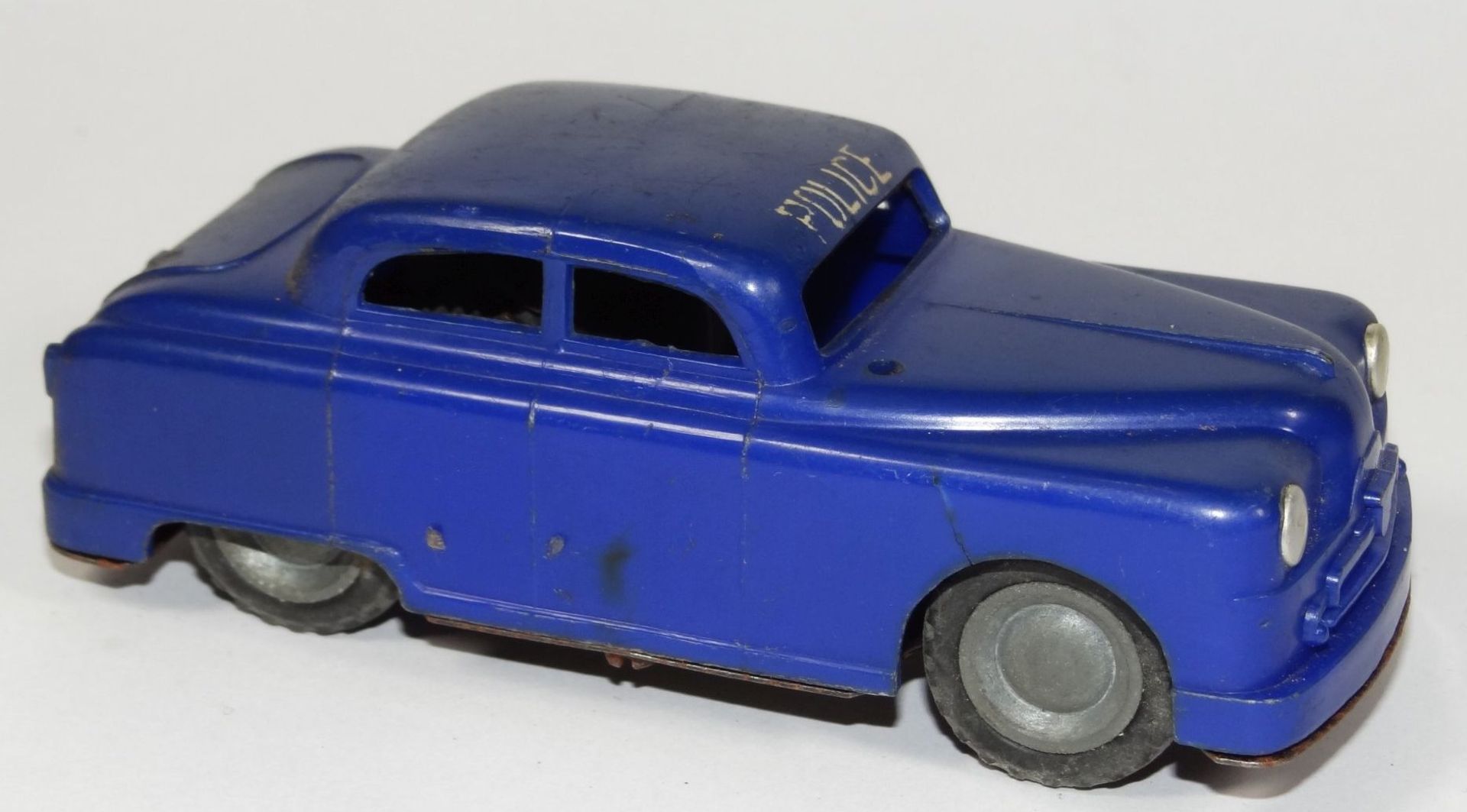 blaues Automodell, Hartplastik/Blechboden, undeutlich gemarkt, L-11,5 cm