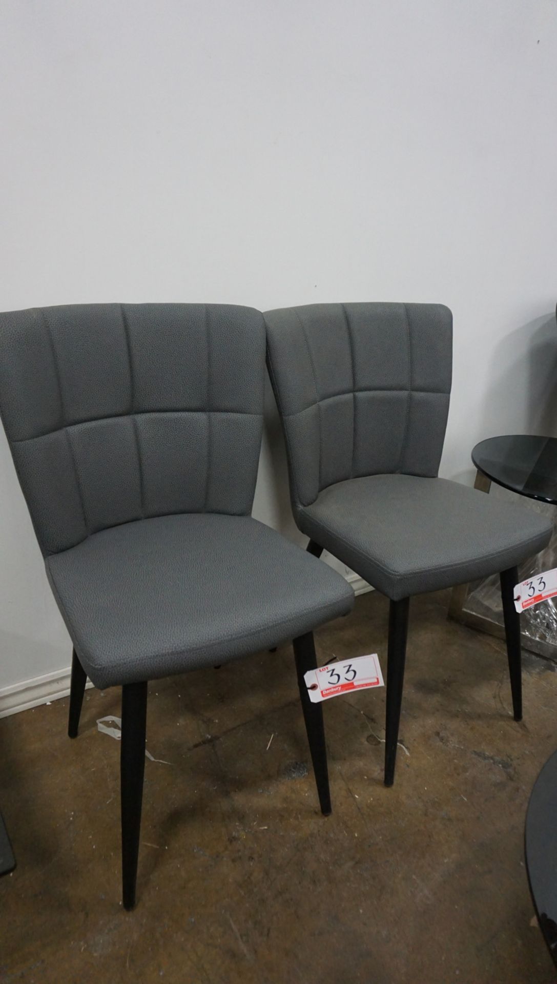 UNITS - DARK GREY PU LEATHER W/ CHECKER TOP STITCHING DINING CHAIRS W/ BLACK METAL LEGS (414-