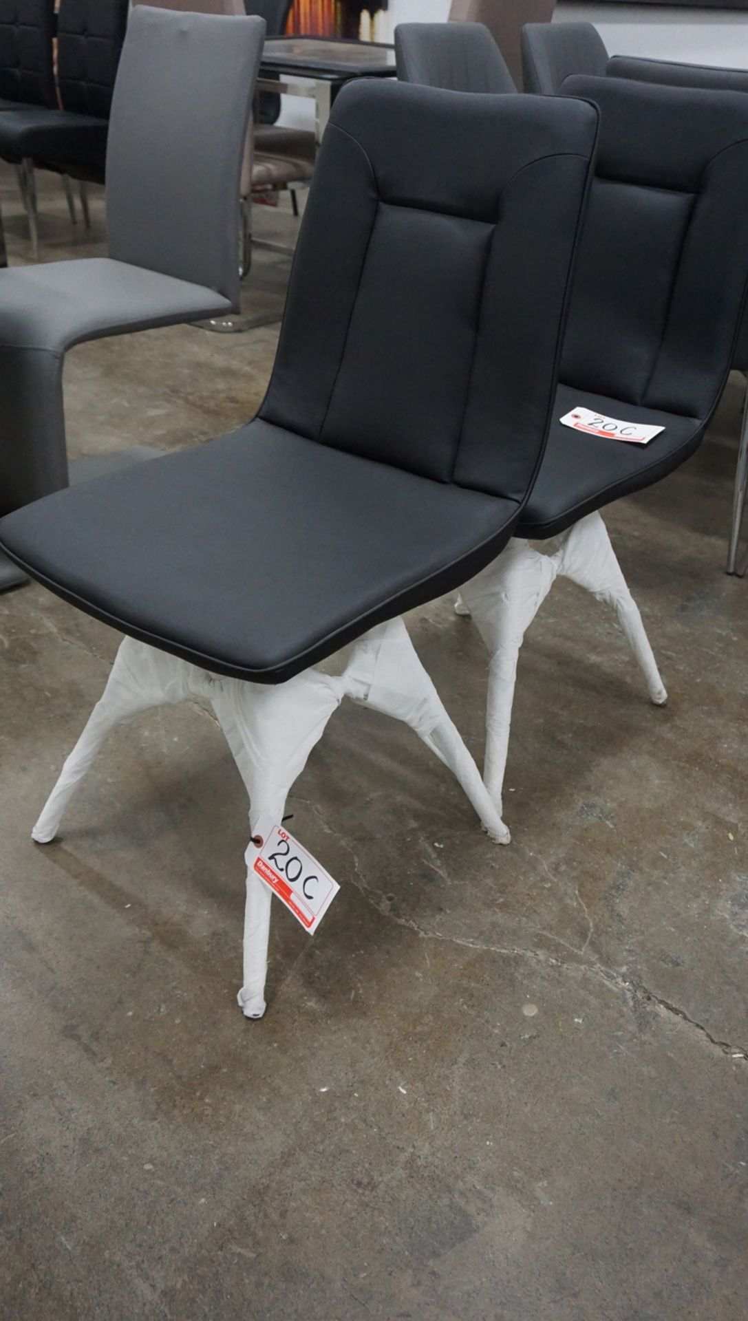 UNITS - BLACK PU LEATHER DINING CHAIRS W/ CHROME LEGS