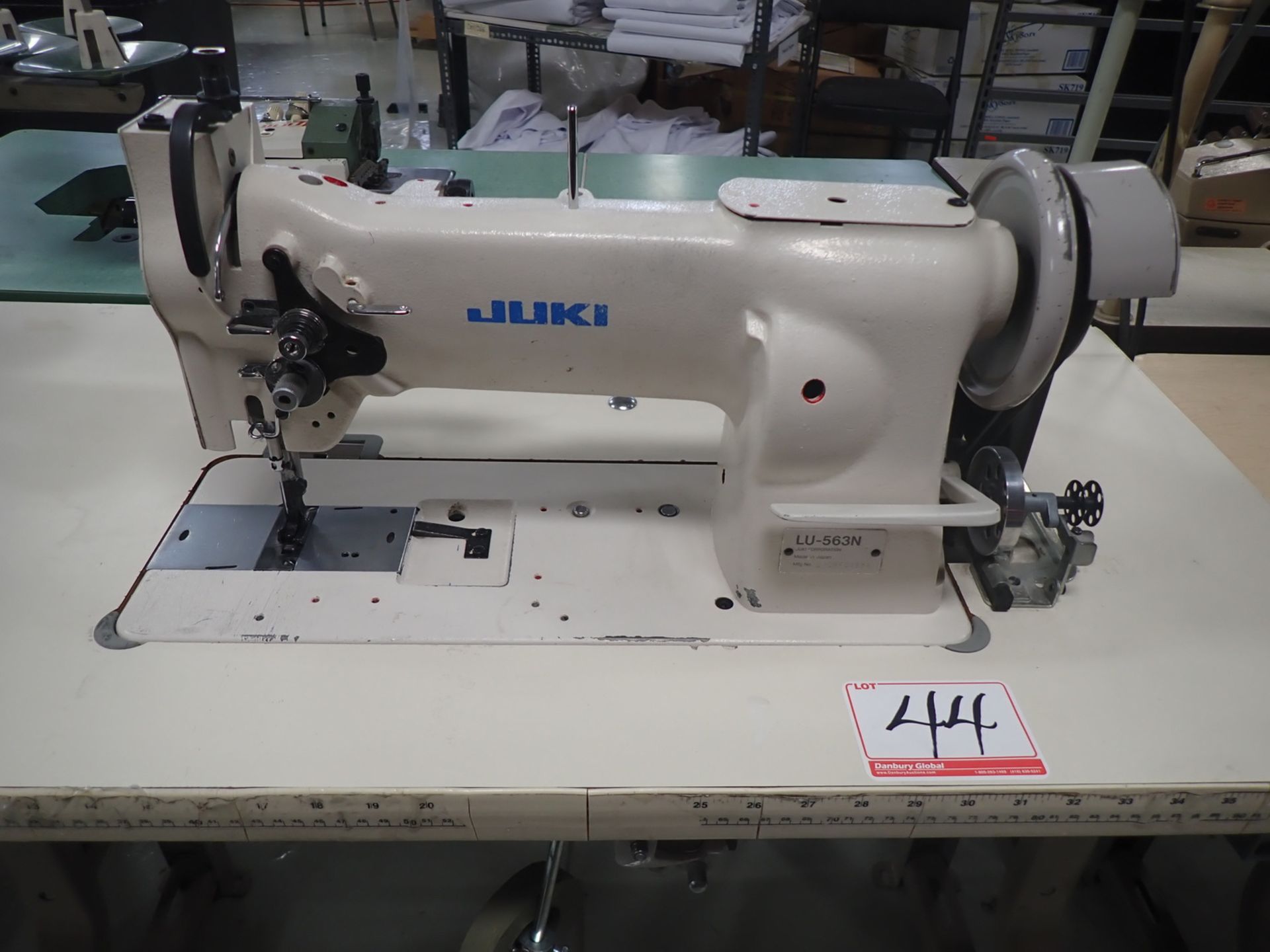 JUKI LU-563N SINGLE NEEDLE WLAKING FOOT MACHINE, S/N LUOBFO4684 W/ 12 BOBBINS, NEEDLES & PIPING FOOR