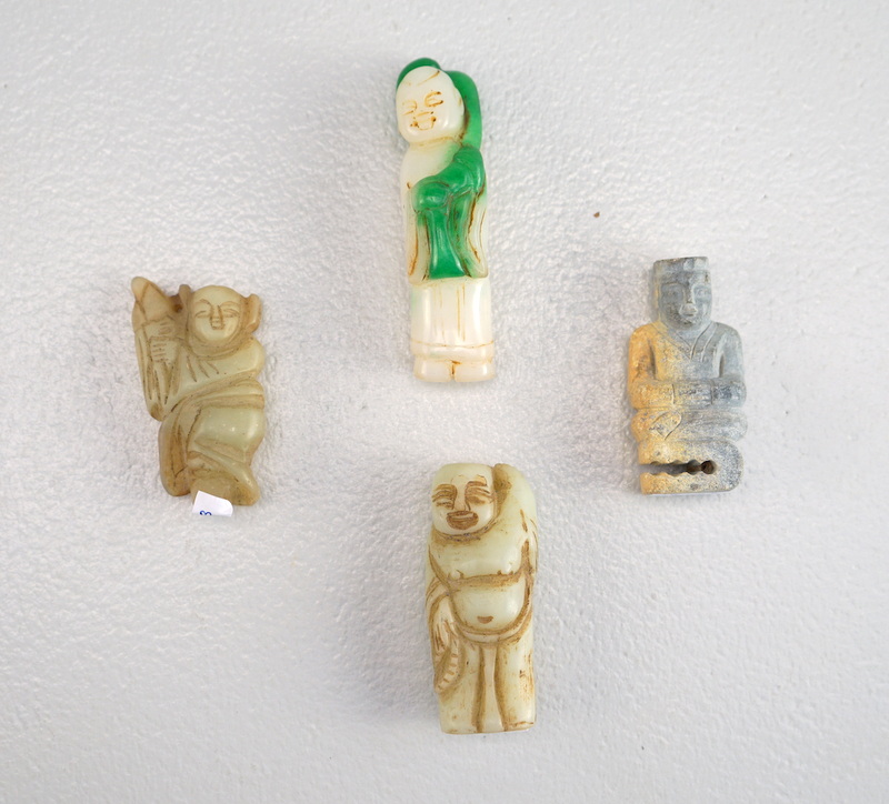 Vier kleine Buddha Figuren