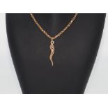 9CT GOLD CHAIN AND HORN PENDANT