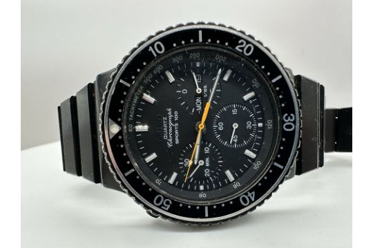 A vintage Seiko sports 100 chronograph watch 1980s, watch is in working  order but would need a se