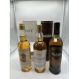 A collection of malt whisky bottles